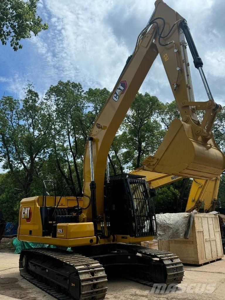 CAT 323 Средни екскаватори 7т - 12т
