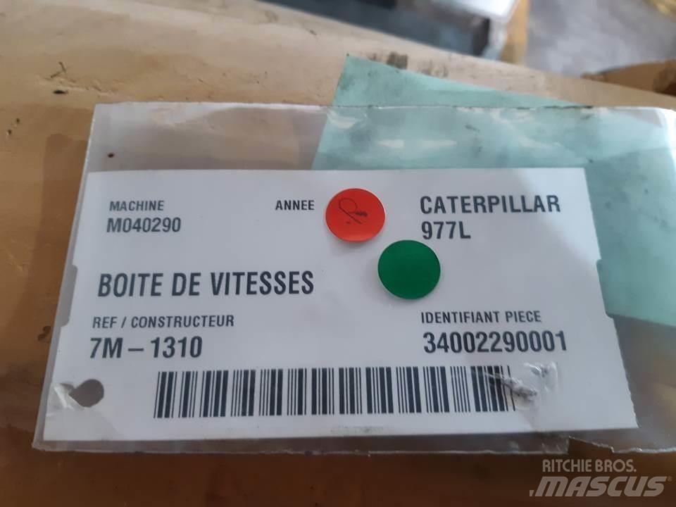 CAT 977L Предаване