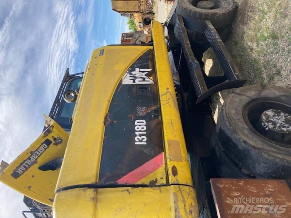 CAT M318D Кабина