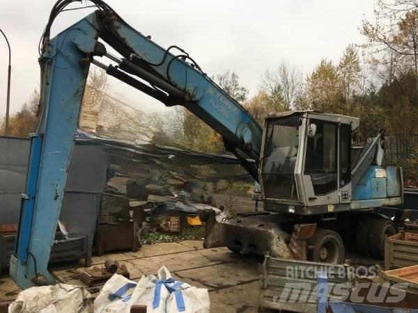 Fuchs MHL 320 Оператори на отпадъци/индустрия
