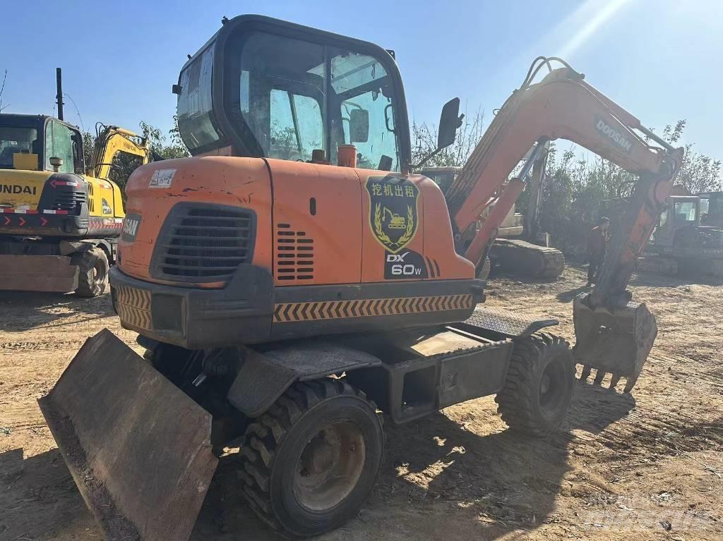 Doosan DX60W Мини екскаватори < 7 т