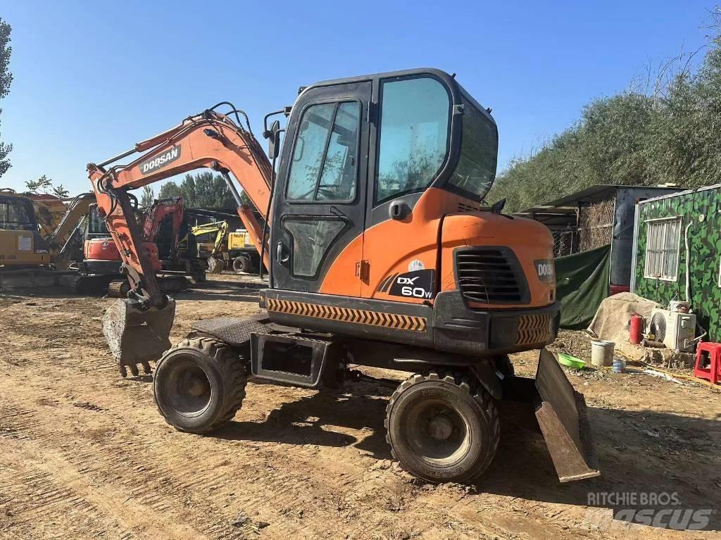 Doosan DX60W Мини екскаватори < 7 т