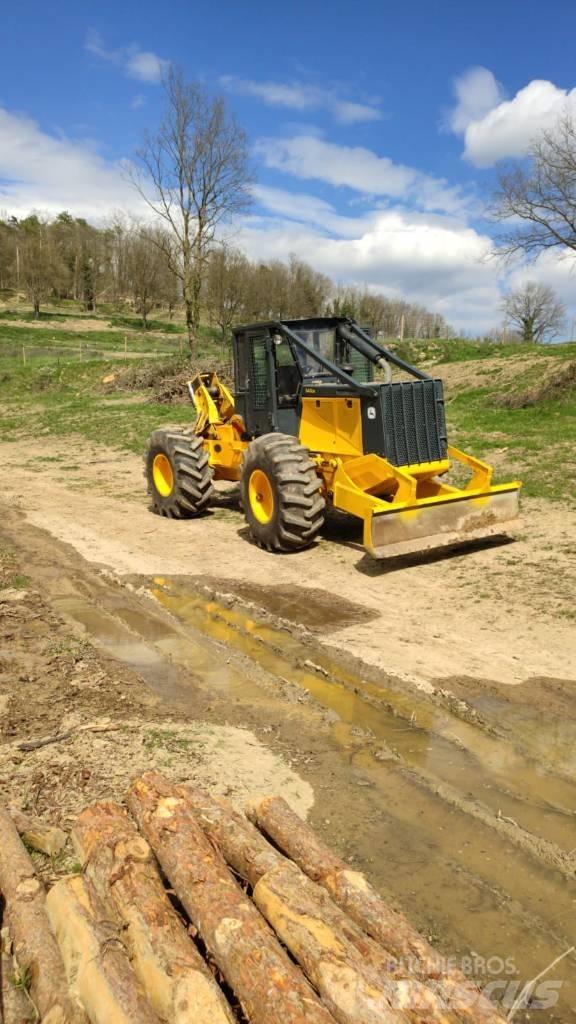 John Deere 640 Скидери
