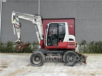 Takeuchi TB295W Колесни екскаватори