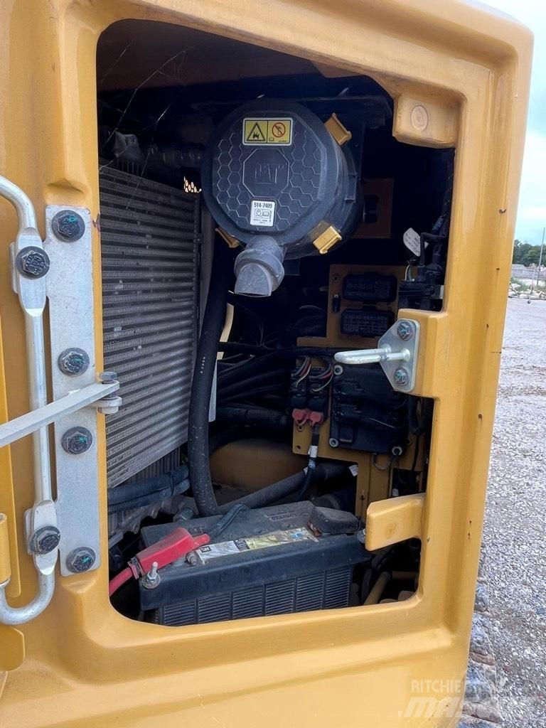 CAT 310 Средни екскаватори 7т - 12т