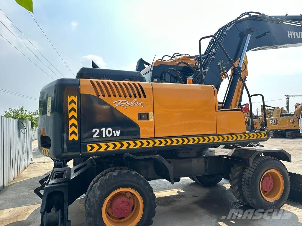 Hyundai 210W-9 Колесни екскаватори