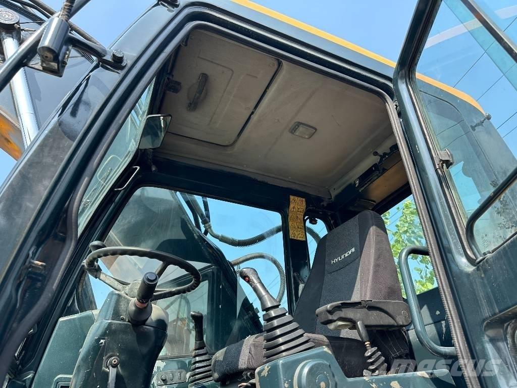 Hyundai 210W-9 Колесни екскаватори