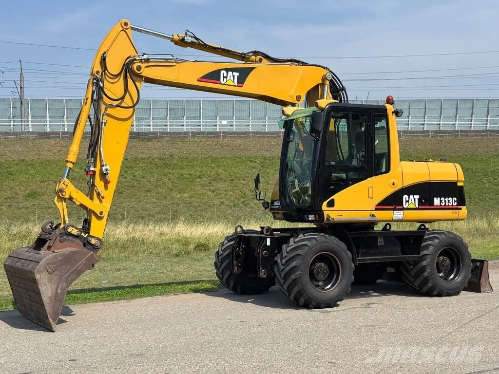 CAT M313C Колесни екскаватори