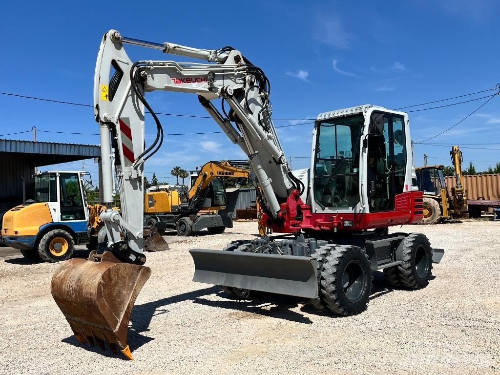 Takeuchi TB 295 Колесни екскаватори