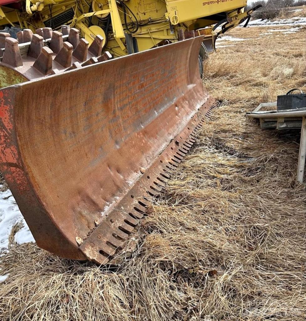 CAT 518 Скидери
