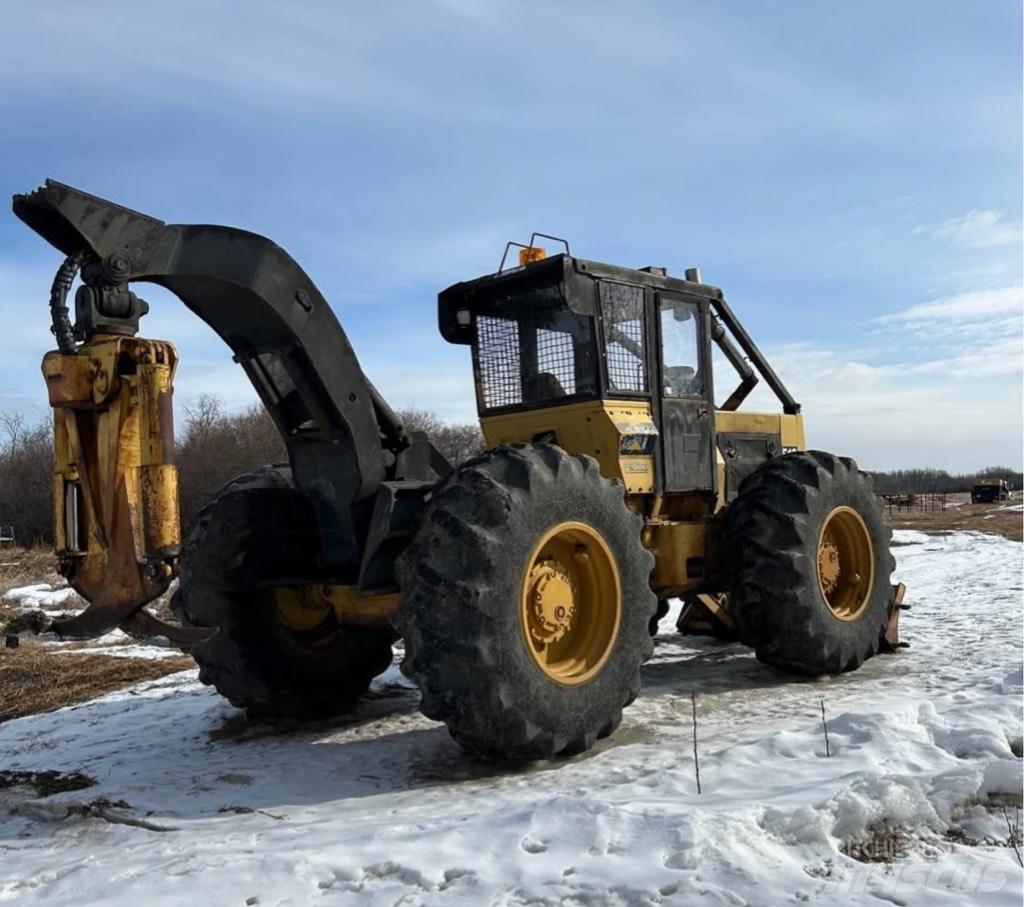 CAT 518 Скидери
