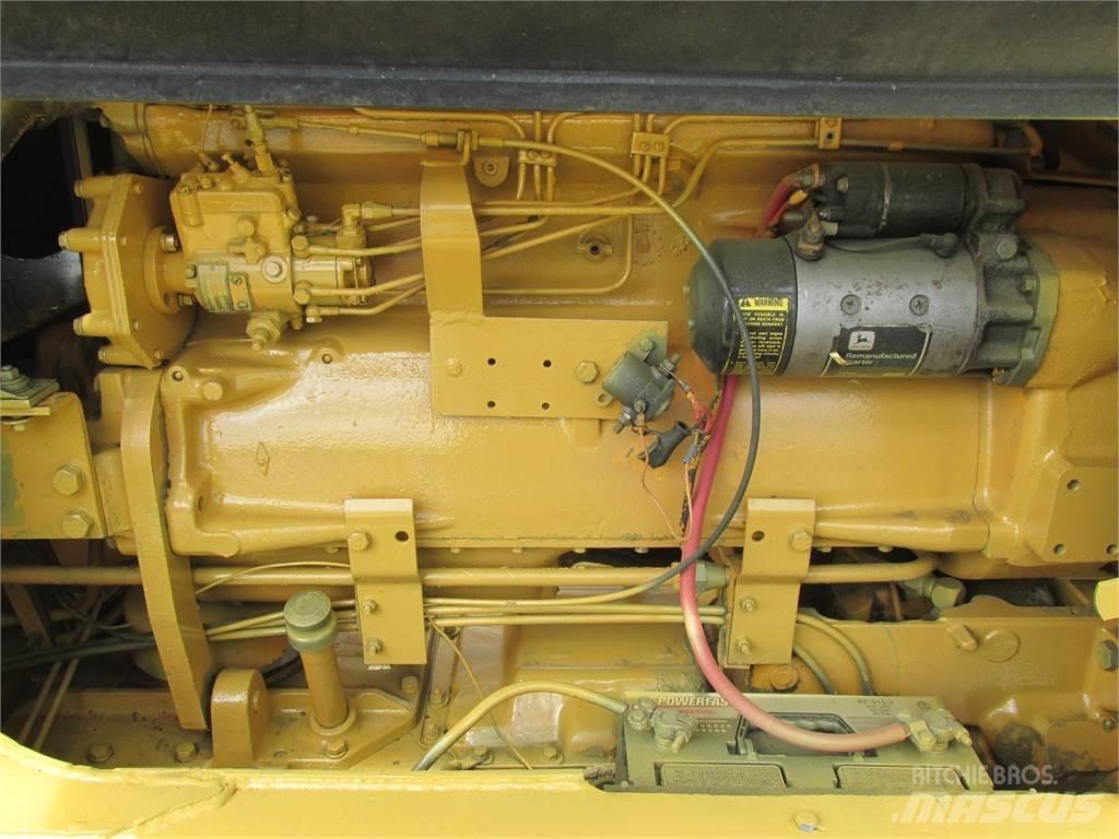 John Deere 570 Грейдери