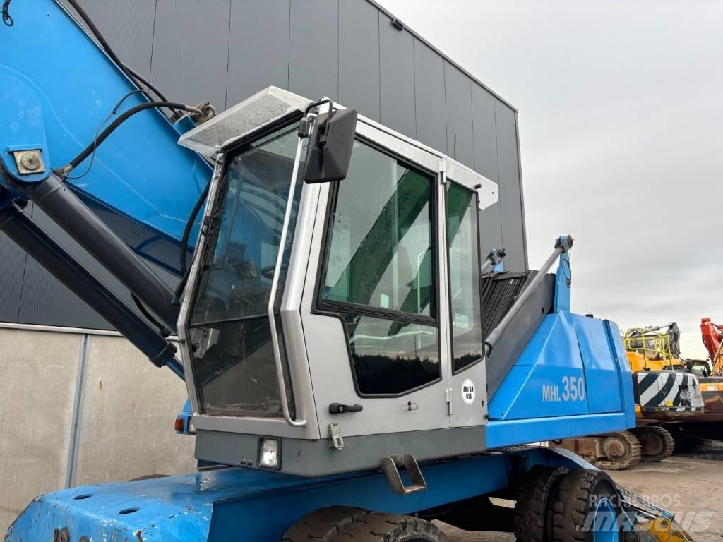 Fuchs MHL350  --  MHL 350 Оператори на отпадъци/индустрия
