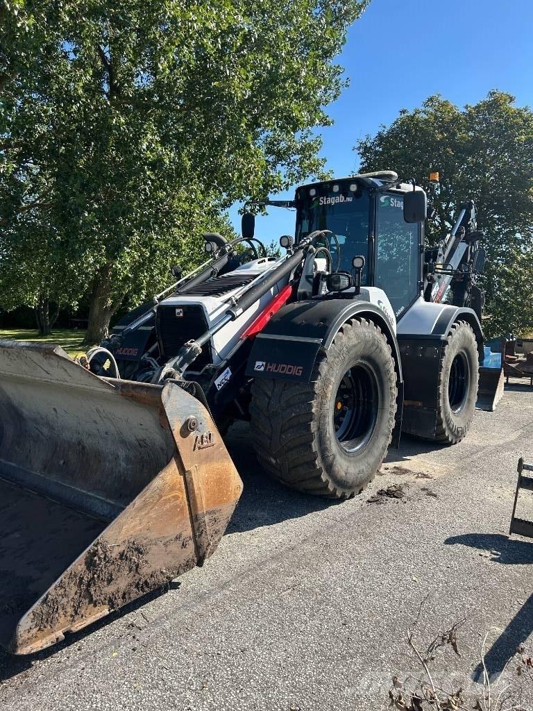Huddig 1260D Товарач със заден ексватор