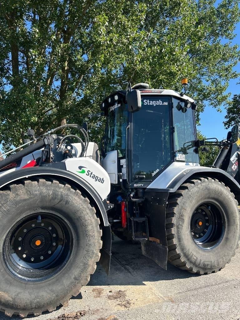Huddig 1260D Товарач със заден ексватор