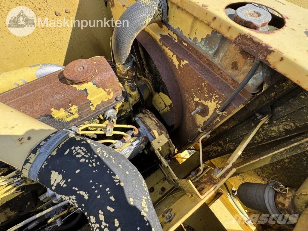 New Holland 1530 Комбайни