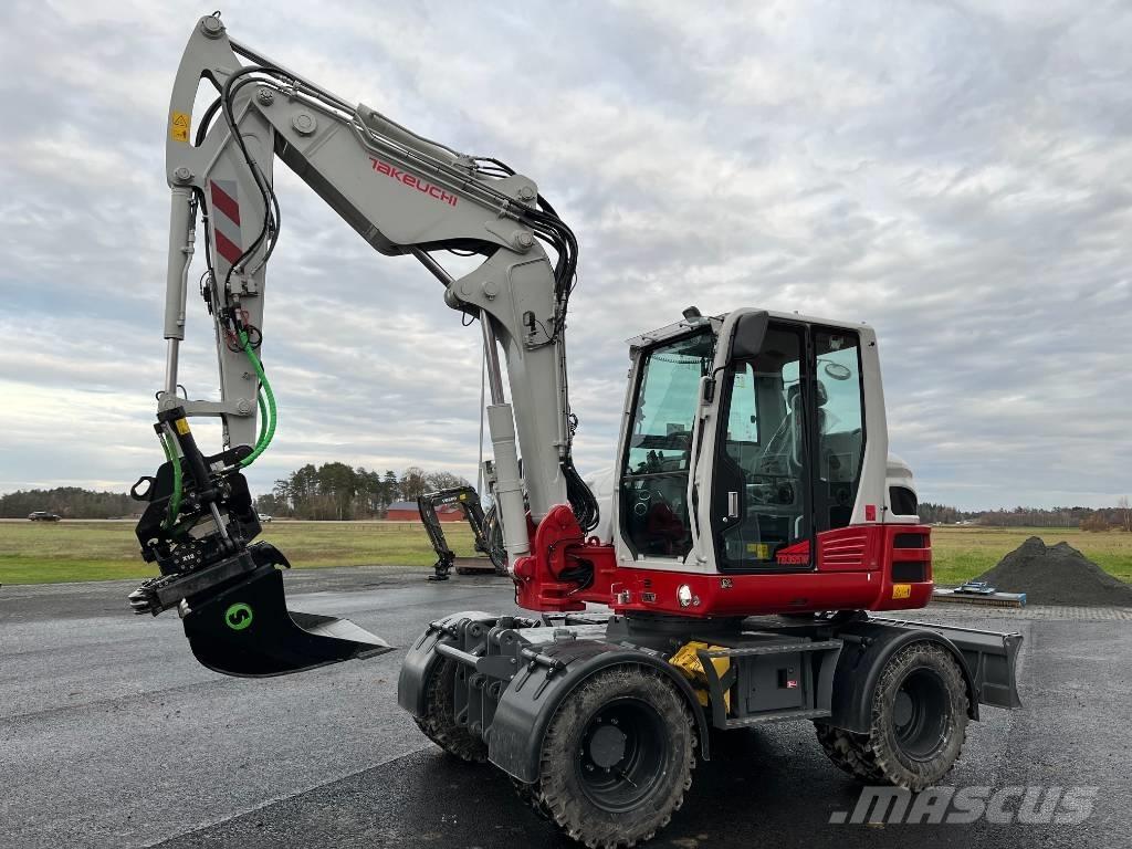 Takeuchi TB 395 W Колесни екскаватори