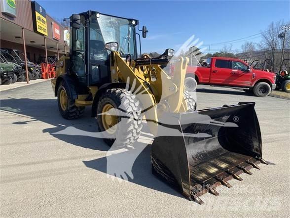 CAT 906M Колесни товарачи