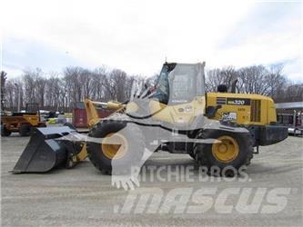 Komatsu WA320 Колесни товарачи