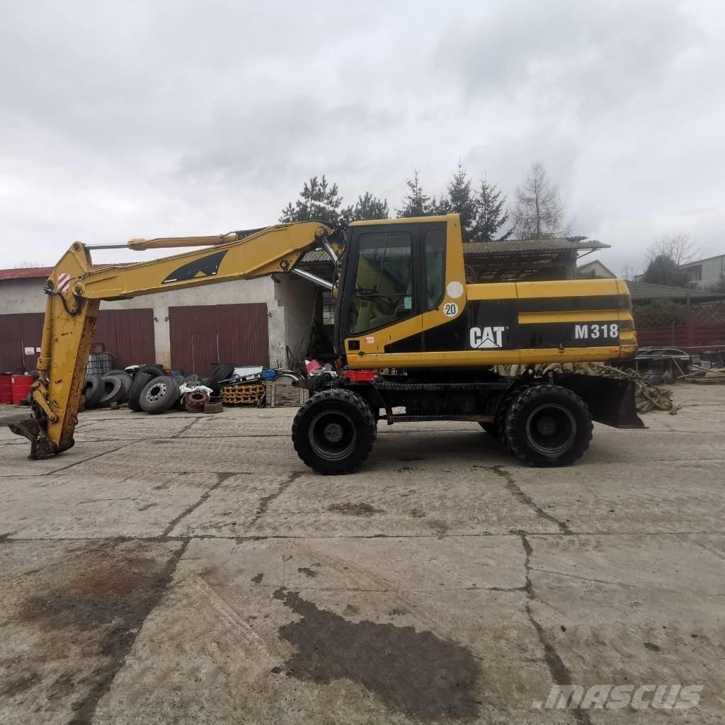 CAT M 318 B Колесни екскаватори