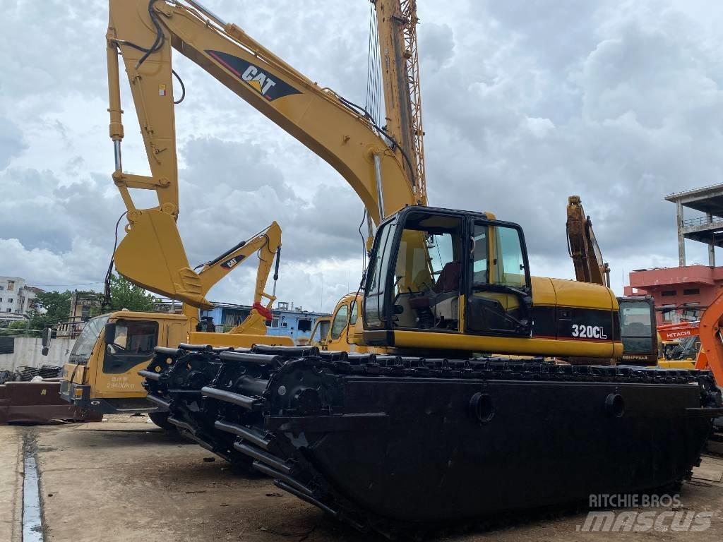 CAT 320 C Багери амфибии