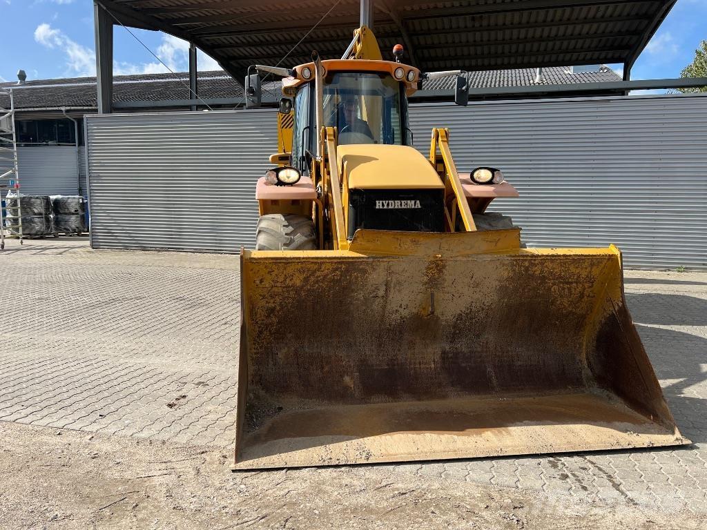 Hydrema 906 E Товарач със заден ексватор