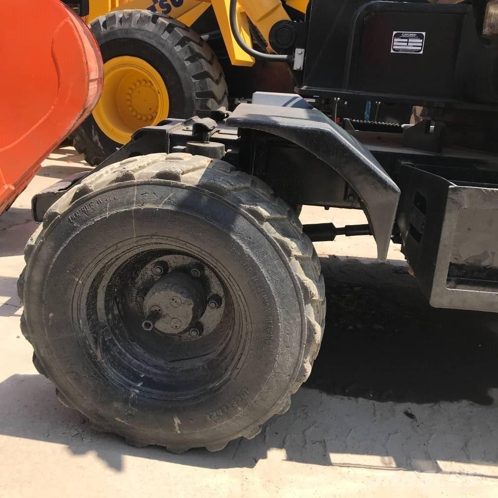 Hyundai 60 W Колесни екскаватори