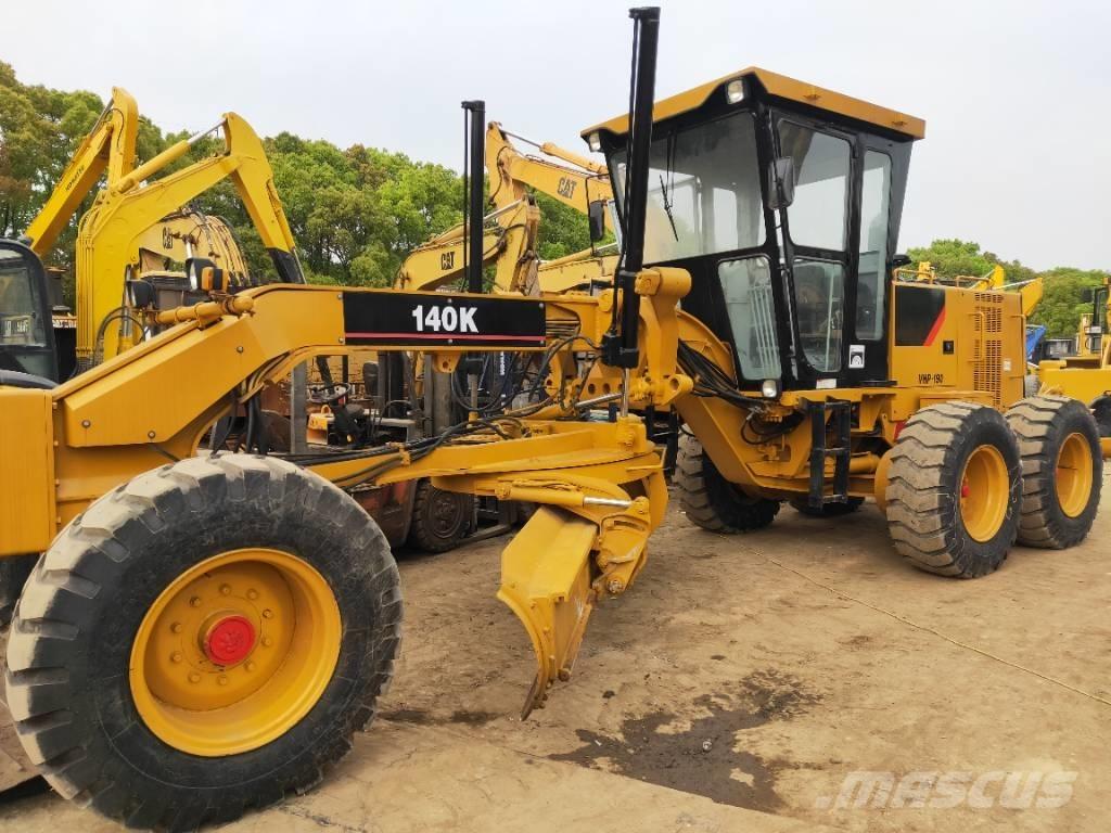 CAT 140K Грейдери