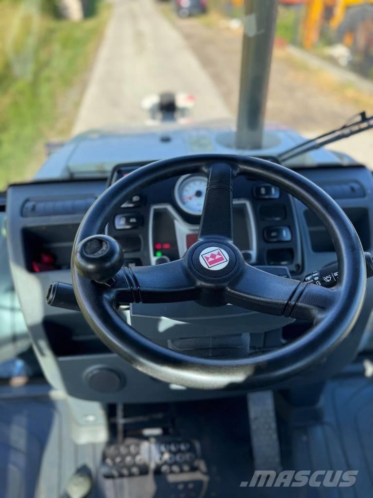 Terex TLB 890 PM Товарач със заден ексватор