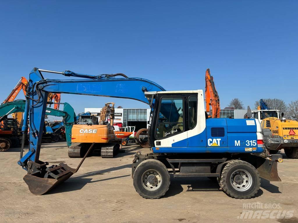 CAT M 315 Колесни екскаватори