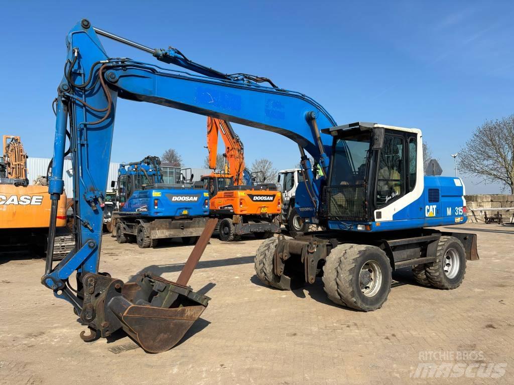 CAT M 315 Колесни екскаватори