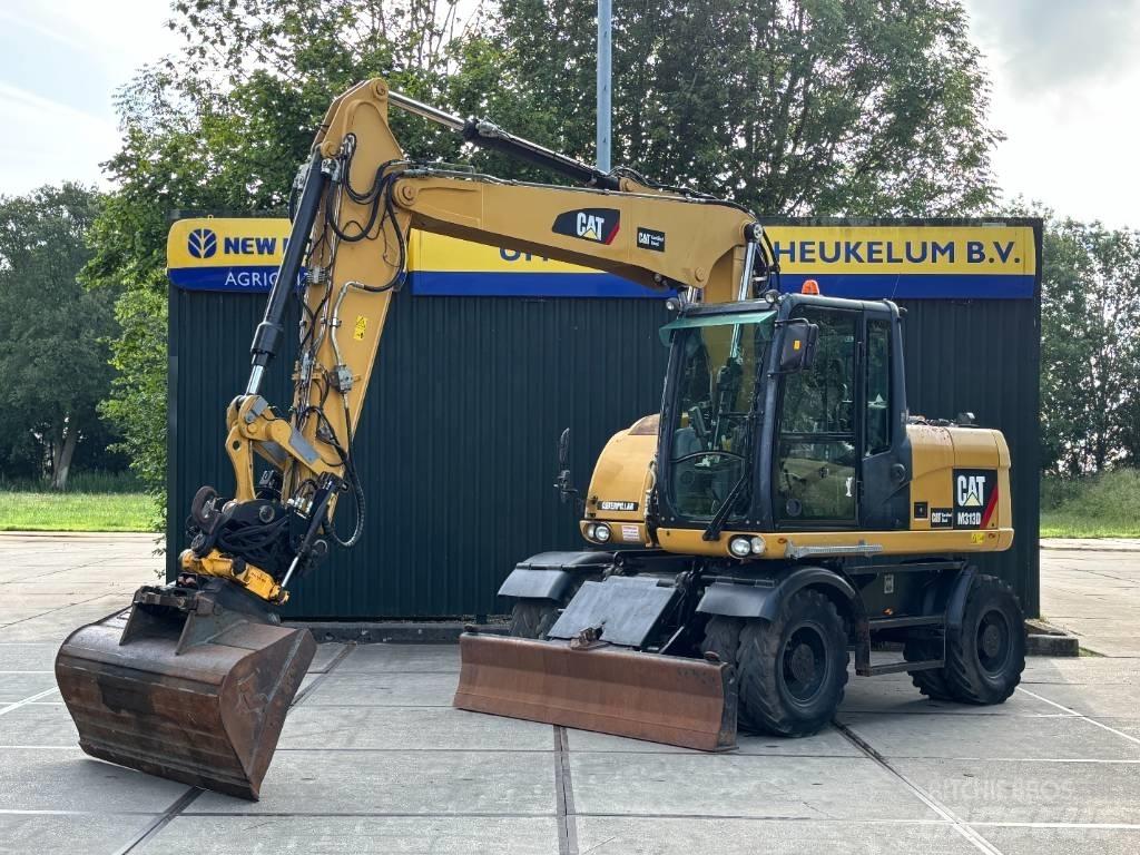 CAT M 313 D Колесни екскаватори