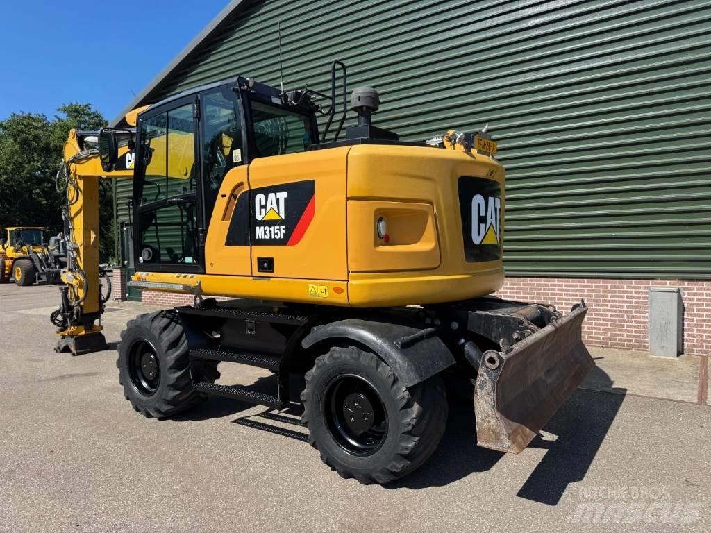 CAT M 315 F Колесни екскаватори
