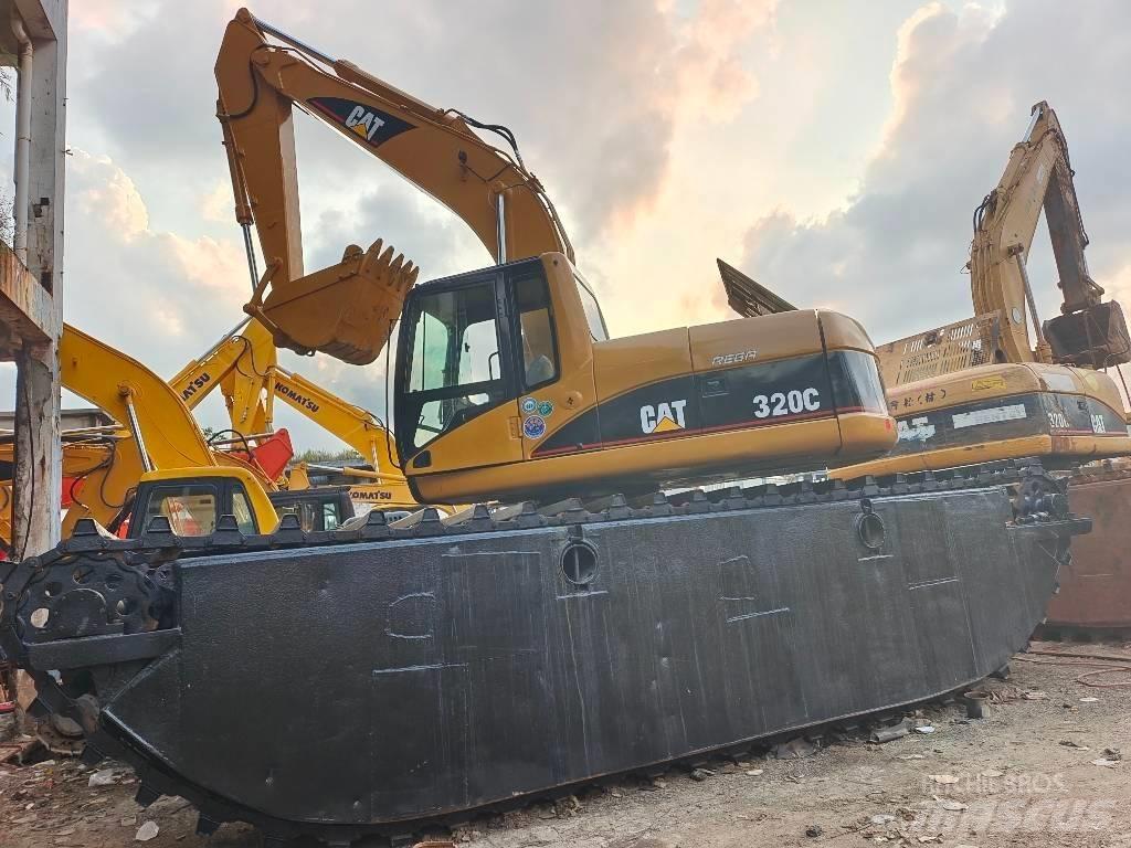 CAT 320 C Багери амфибии