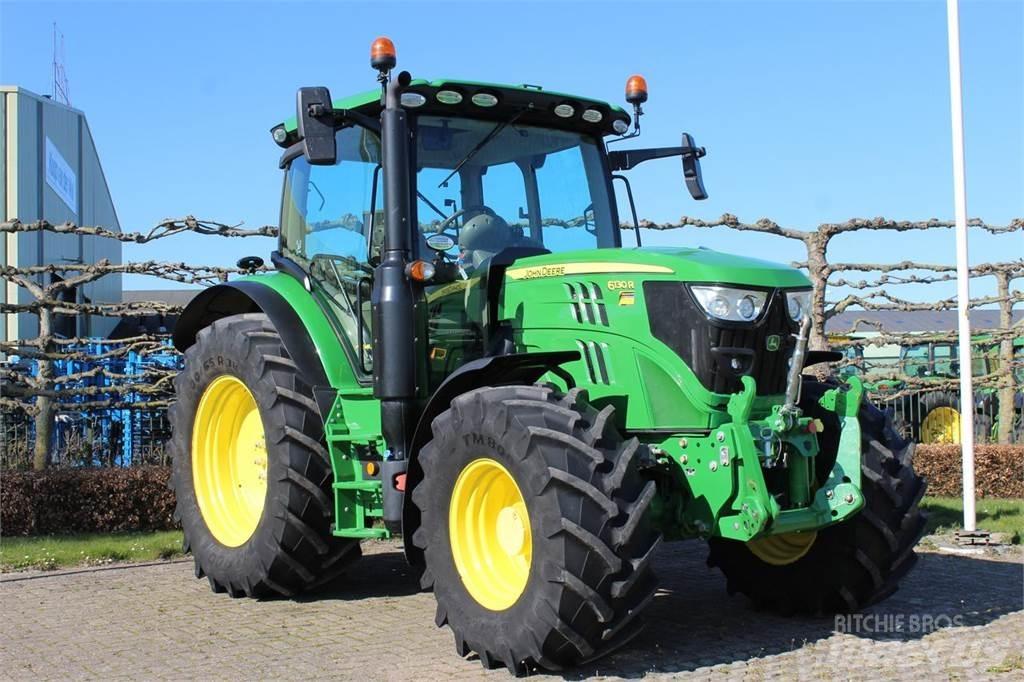 John Deere 6130R Трактори