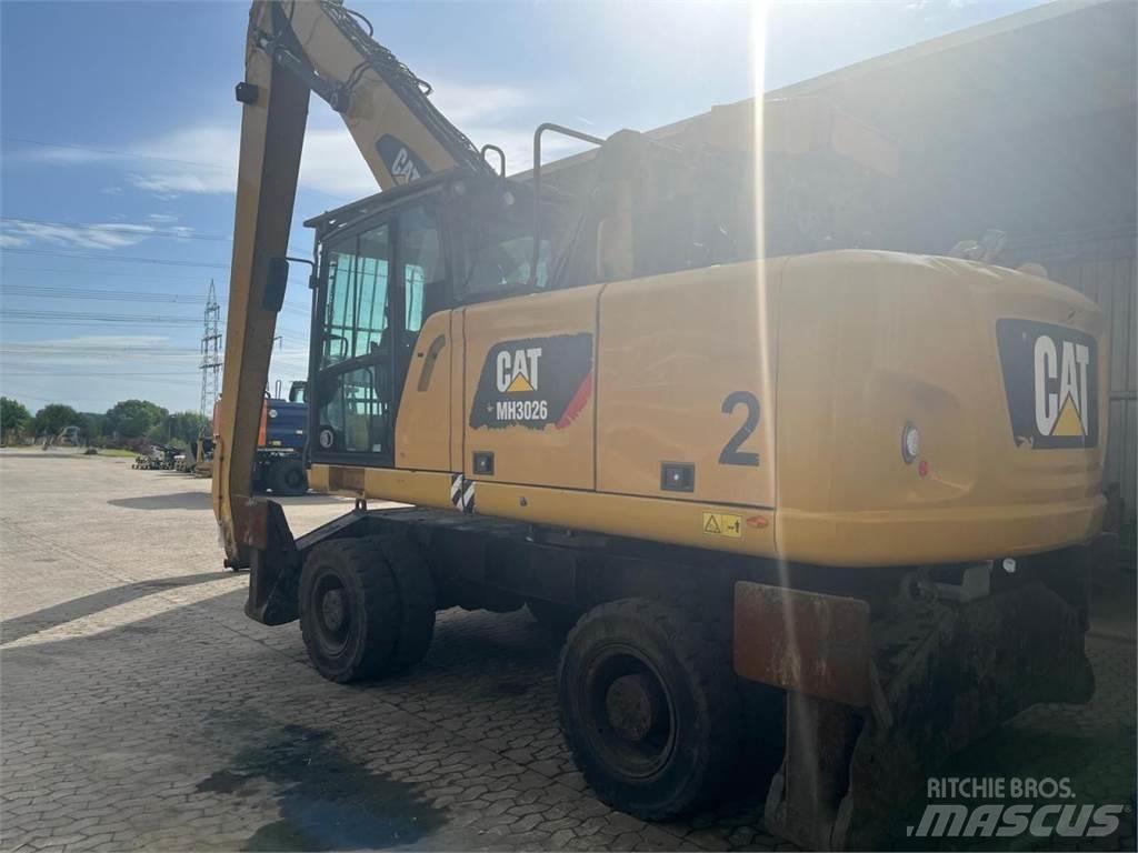 CAT MH3026 Колесни екскаватори