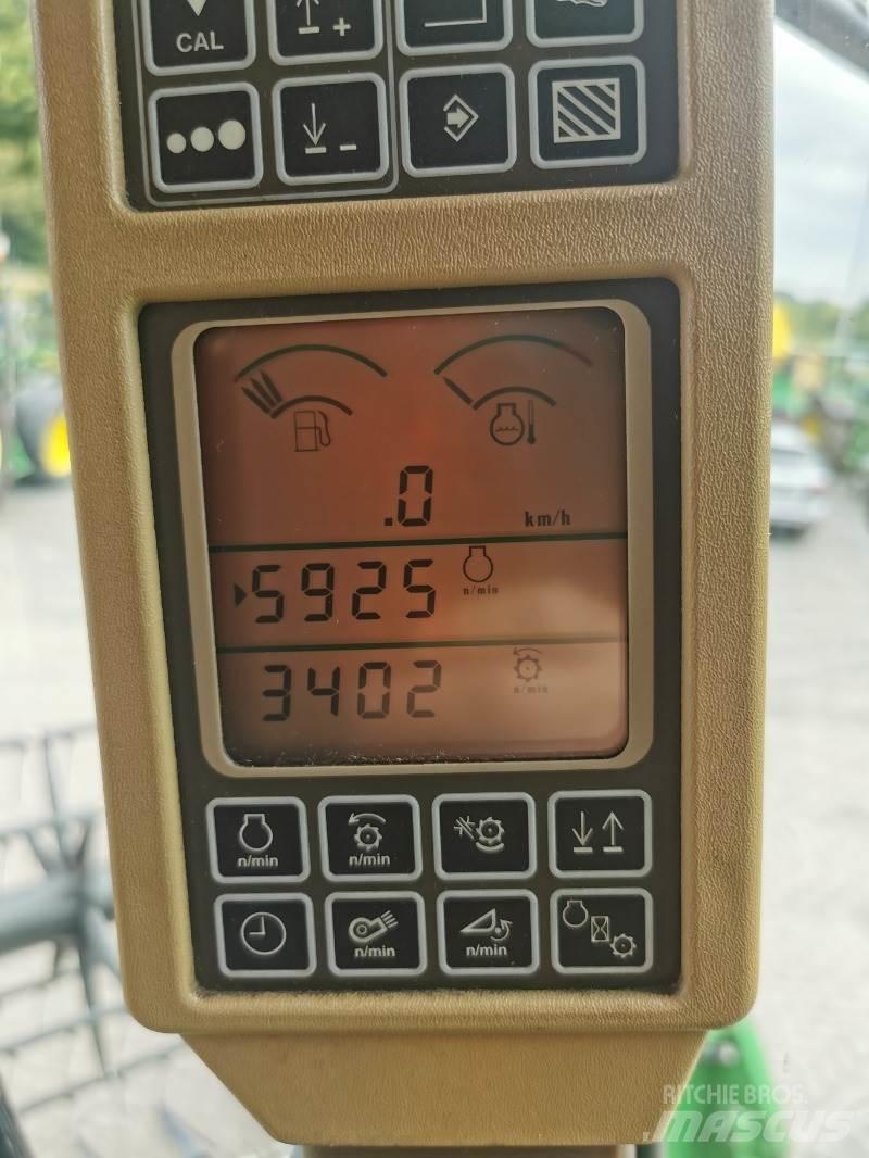 John Deere T560 Комбайни