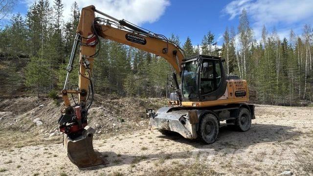 CASE WX 148 Колесни екскаватори