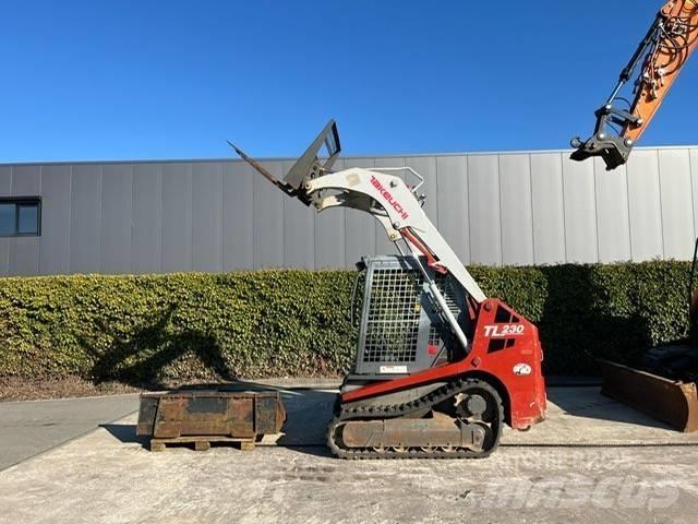 Takeuchi TL 230 Мини товарачи
