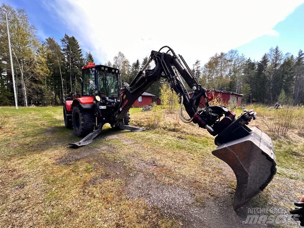 Huddig 860 D Товарач със заден ексватор