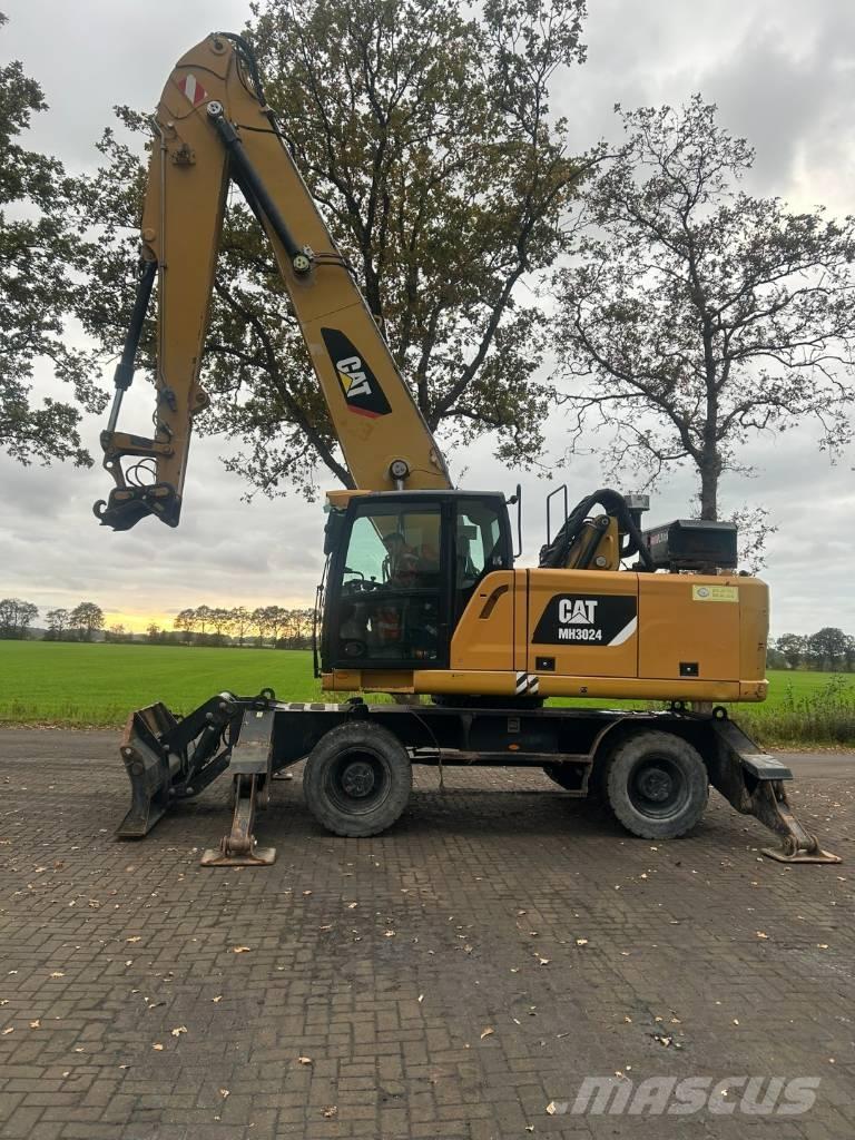 CAT MH 3024 Оператори на отпадъци/индустрия
