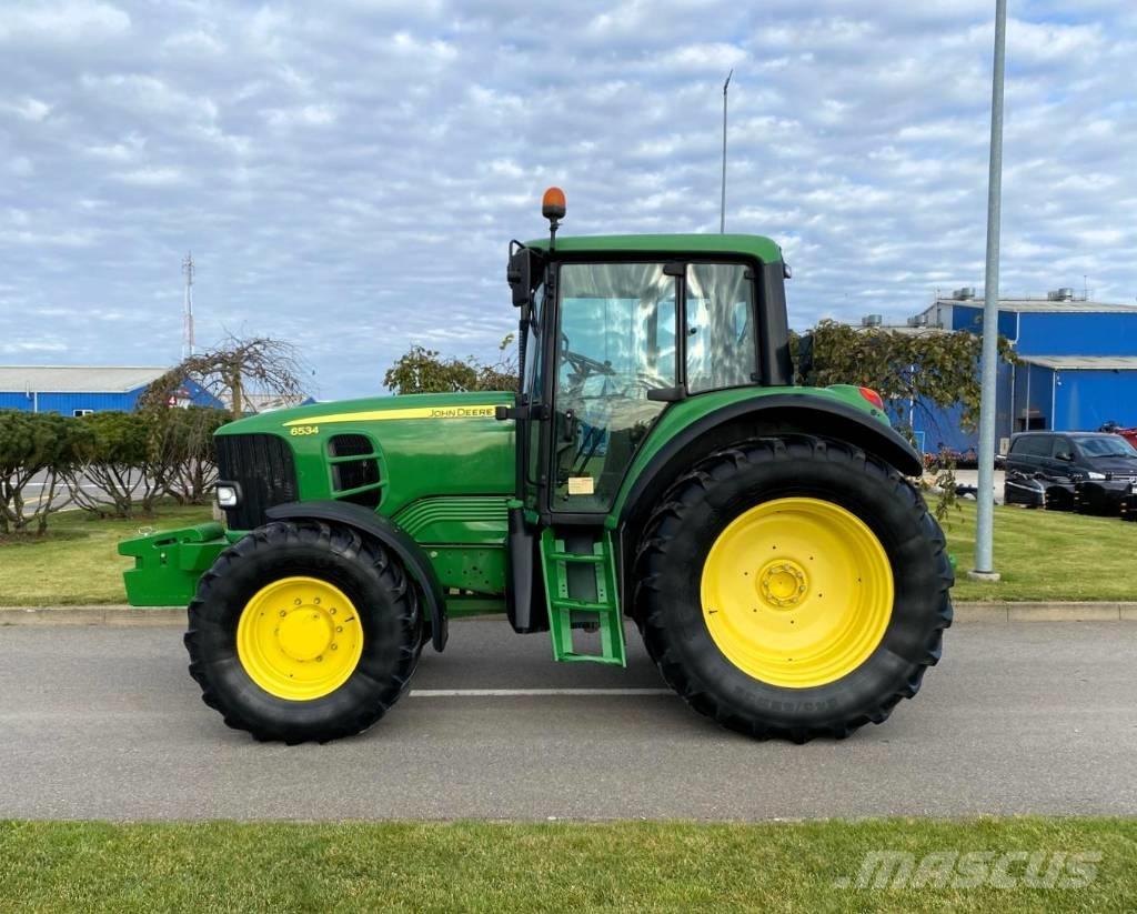 John Deere 6534 Трактори