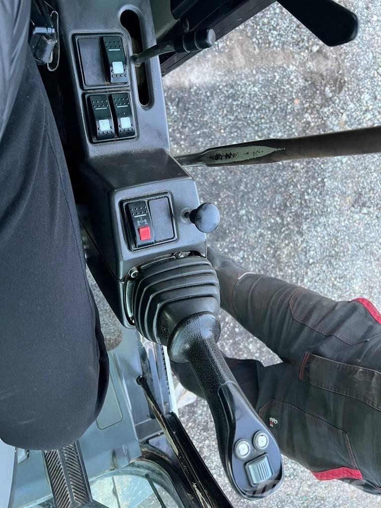 CAT M 313 D Колесни екскаватори