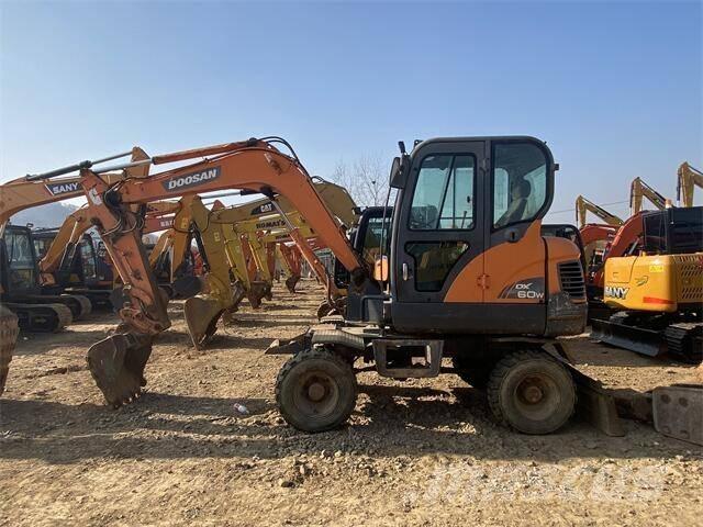 Doosan DX60W Колесни екскаватори