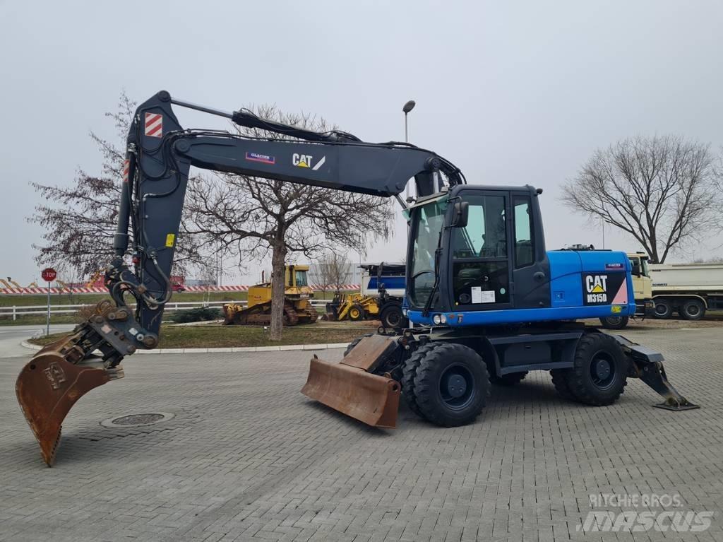 CAT M315D 2 buckets Колесни екскаватори