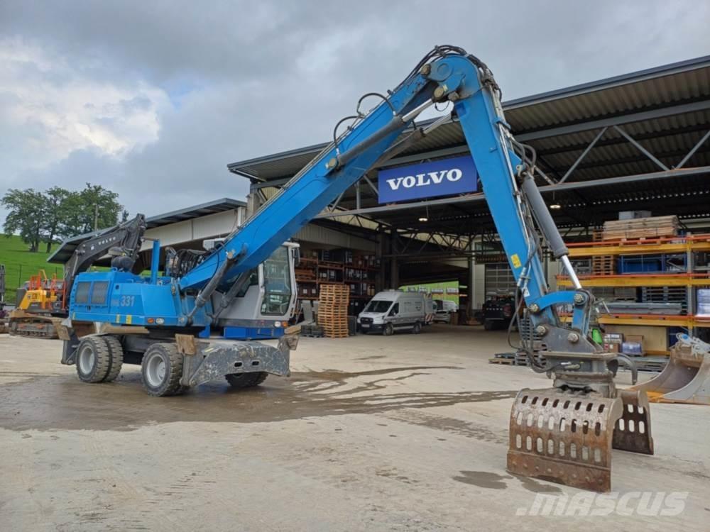 Fuchs MHL 331 Оператори на отпадъци/индустрия
