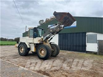 Volvo L 70 C Товарач със заден ексватор
