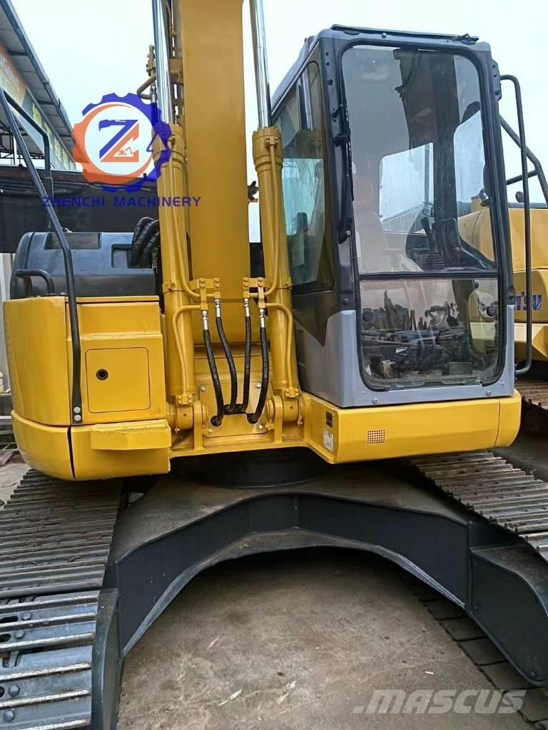 Komatsu PC 128 US Средни екскаватори 7т - 12т