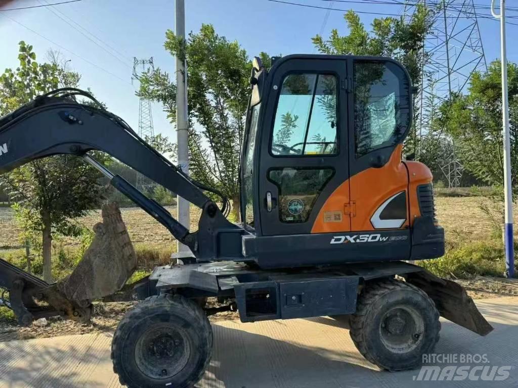 Doosan DX60W Колесни екскаватори