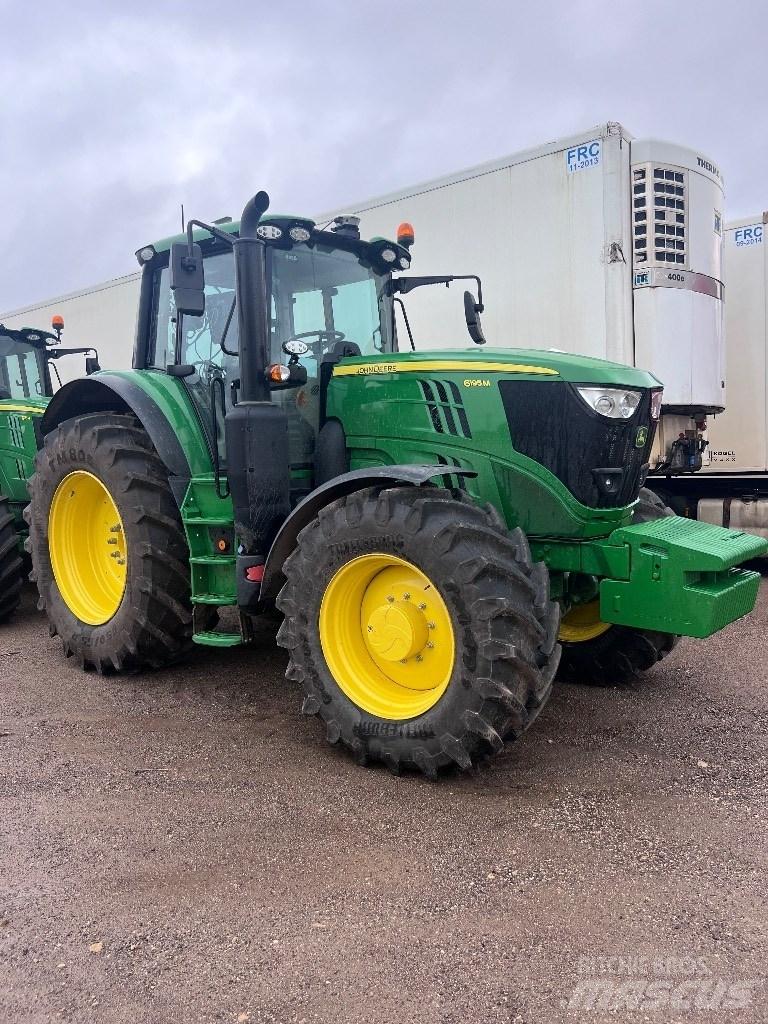 John Deere 6195M Трактори
